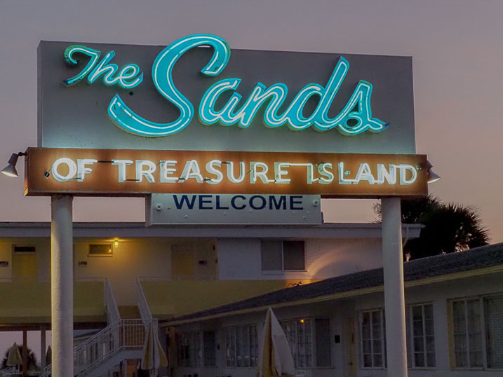 The Sands of Treasure Island welcomes you with its iconic signage at the front entrance on Gulf Boulevard.